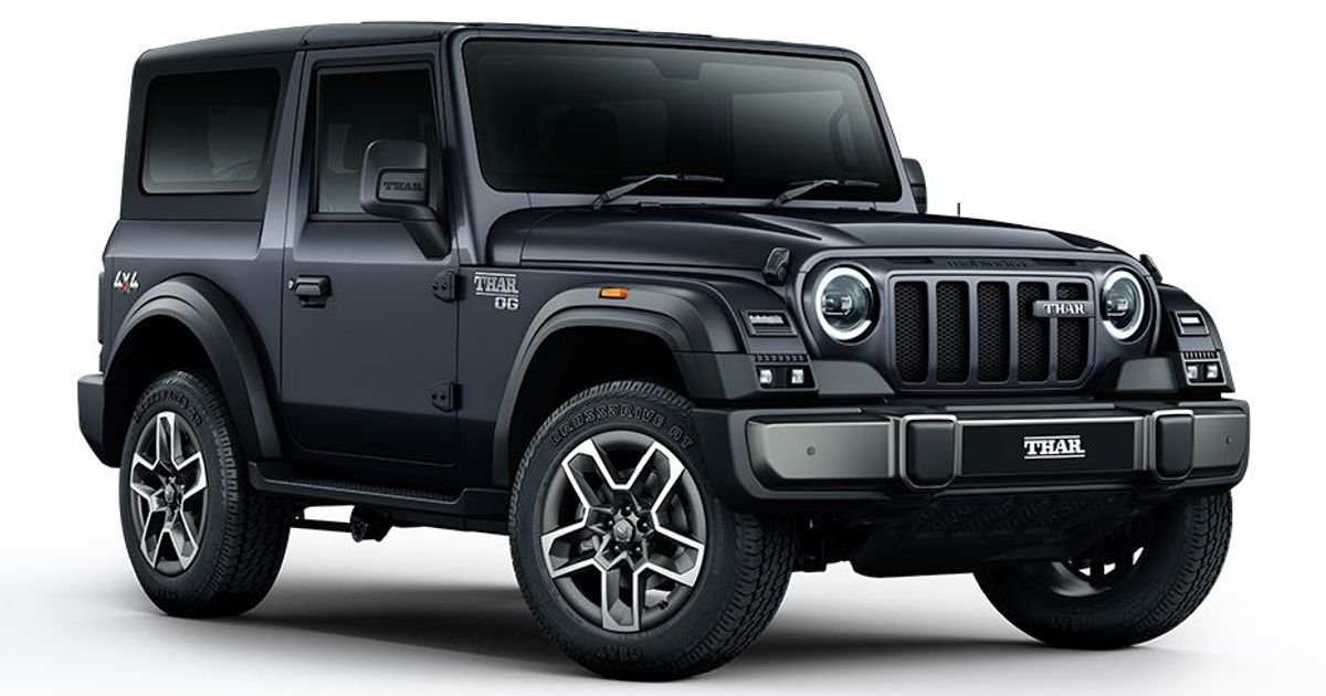 2026 Mahindra Thar OG rugged black SUV with round headlights and seven-slot grille
