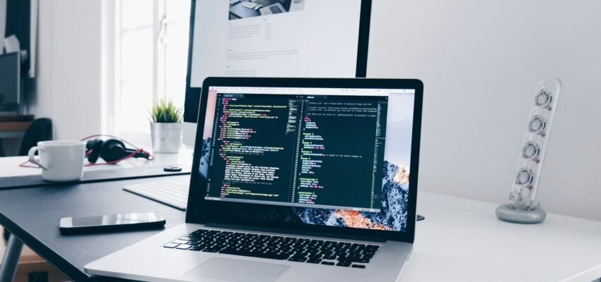 Laptop and digital workspace representing AI automation in small business